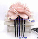 The new Korean high-end fabric burning iron edge flower hair comb five-tooth insert comb boutique hair accessories camellia plate hair fork