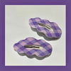 A purple rhombus bb clip