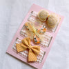 Yellow striped bow