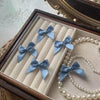 A touch of blue bow hair clip single