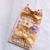 Yellow patchwork bow