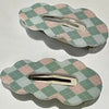 A green rhombic bb clip