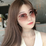 Fashion net red style frameless sunglasses women 2020 new big frame trendy sunglasses women ins round face street shooting glasses