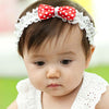 Polka dot red bow