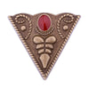 Red dot on ancient bronze