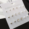 9 pairs of silver