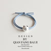 Silver bear blue rope
