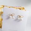 A pair of s925 silver bow stud earrings