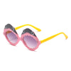 Pink frame yellow feet