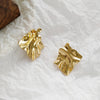 A pair of geometric ear clips