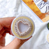 Gold wire bracket - no. 21 pearl hollow heart - white