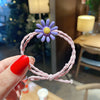 Purple daisy hair tie