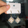 Preserved gold rhombus earhooks