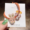 Orange hair tie