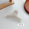 9cm pearl clip.