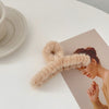 1# light brown plush gripper.