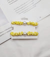 Light yellow hair tie