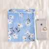 Medium size with white flowers on blue background