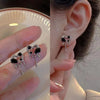 Pair of silver stud earrings