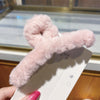 Pale pinkish gray