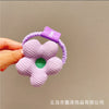 Purple cotton filled flower hair tie