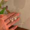 Camellia bow earrings