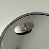 Silver metal-pink diamond planet