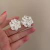 Pair of stud earrings