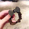 Brown diamond bow