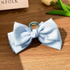 Blue bow grab clip