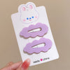 A pair of clouds and purple (individual card packaging)