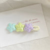 Green purple smiling face five pointed star