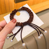 Dark brown pearl knotted hair tie