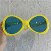 Huge oval yellow glasses