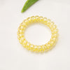 Transparent telephone cord hair tie-dark yellow