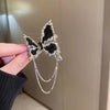 Tassel butterfly brooch