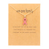 Gold card with pink ribbon
