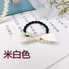 Off-white ribbon bow hair tie