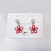 Hollow shell bead red flower earrings (silver pin)