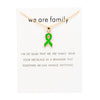 White card with green ribbon