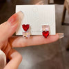 Asymmetric heart zirconia stud earrings