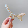 62# large pearl fishtail clip (packed in a separate opp bag)