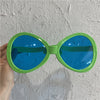 Huge oval green glasses