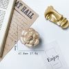 Bracket - cloud camellia gold