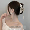 G63 golden hollow butterfly tassel