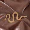 Gold snake brooch