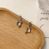 A pair of s925 silver needle geometric stud earrings