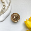Metal bracket - ruffled beauty head - gold