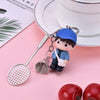 Light blue child + badminton racket