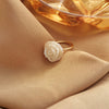 A white flower ear cuff